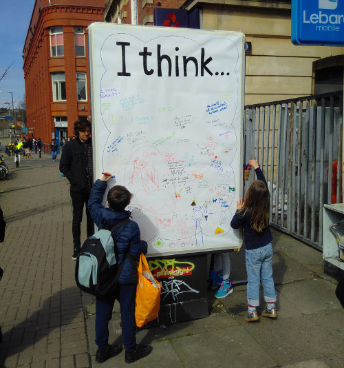 Bristol UK: Ad cover up asks, "How are you today?"
